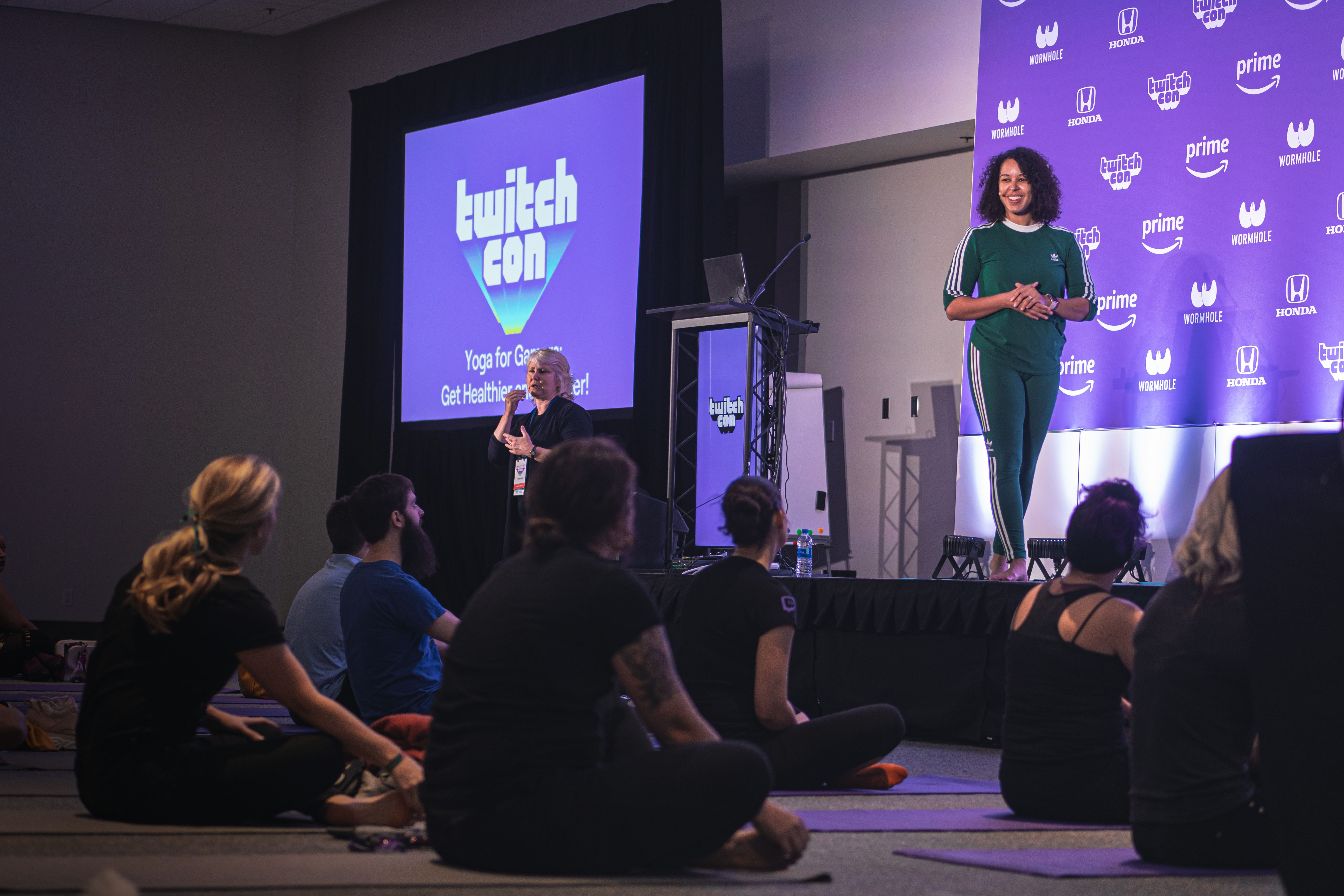 Amber leading the Yoga For Gamers panel at TwitchCon